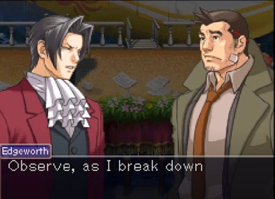 An in-game screenshot of Miles Edgeworth from the Ace Attorney series. The textbox underneath him reads: Observe as I break down