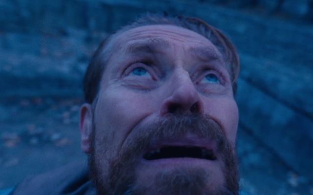 an image of willem defoe looking up with a horrified expression on his face, as though frozen with terrified awe at the vastness of some celestial object